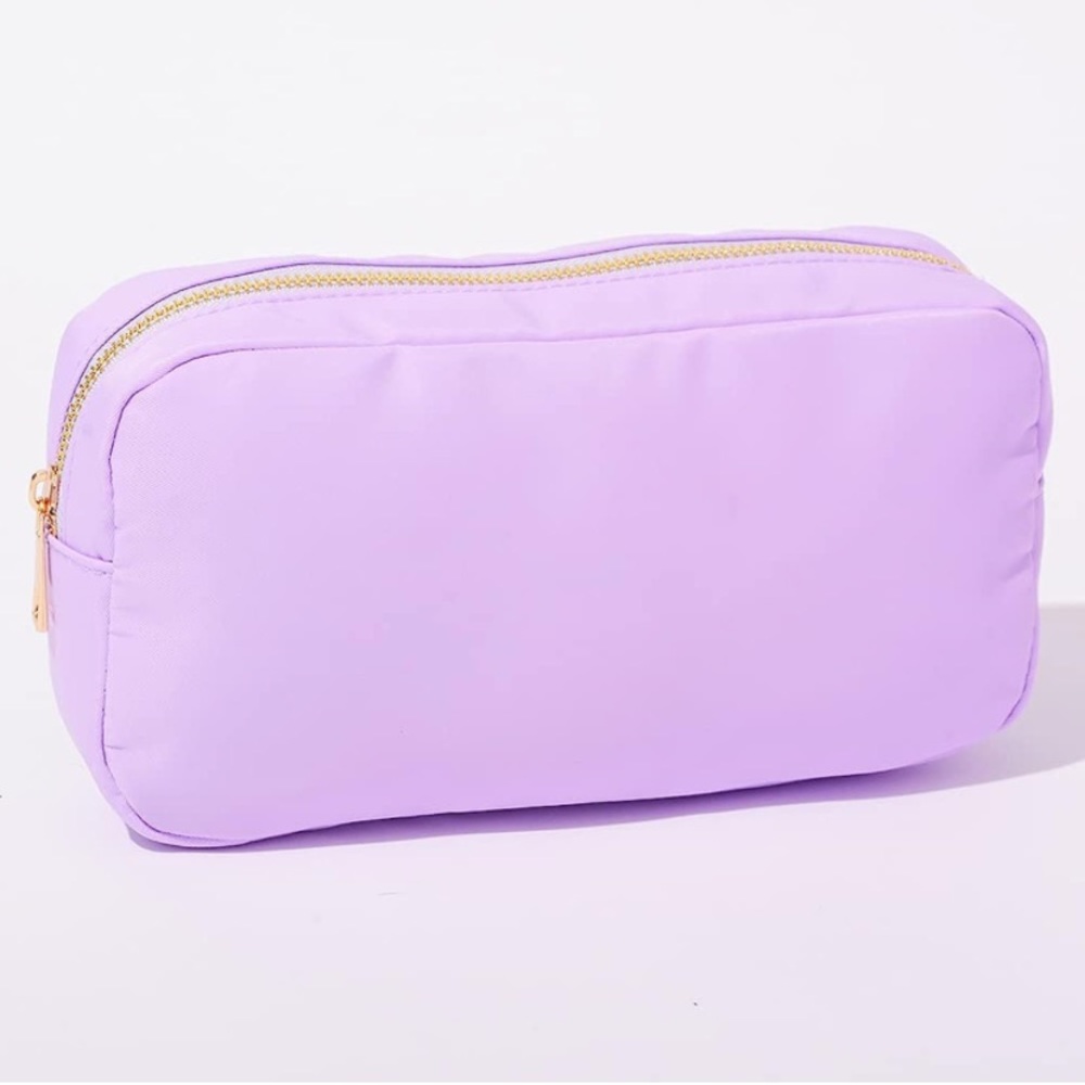 Brand new Medium light purple nylon pouch